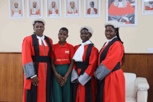 Four girls in court justice robes